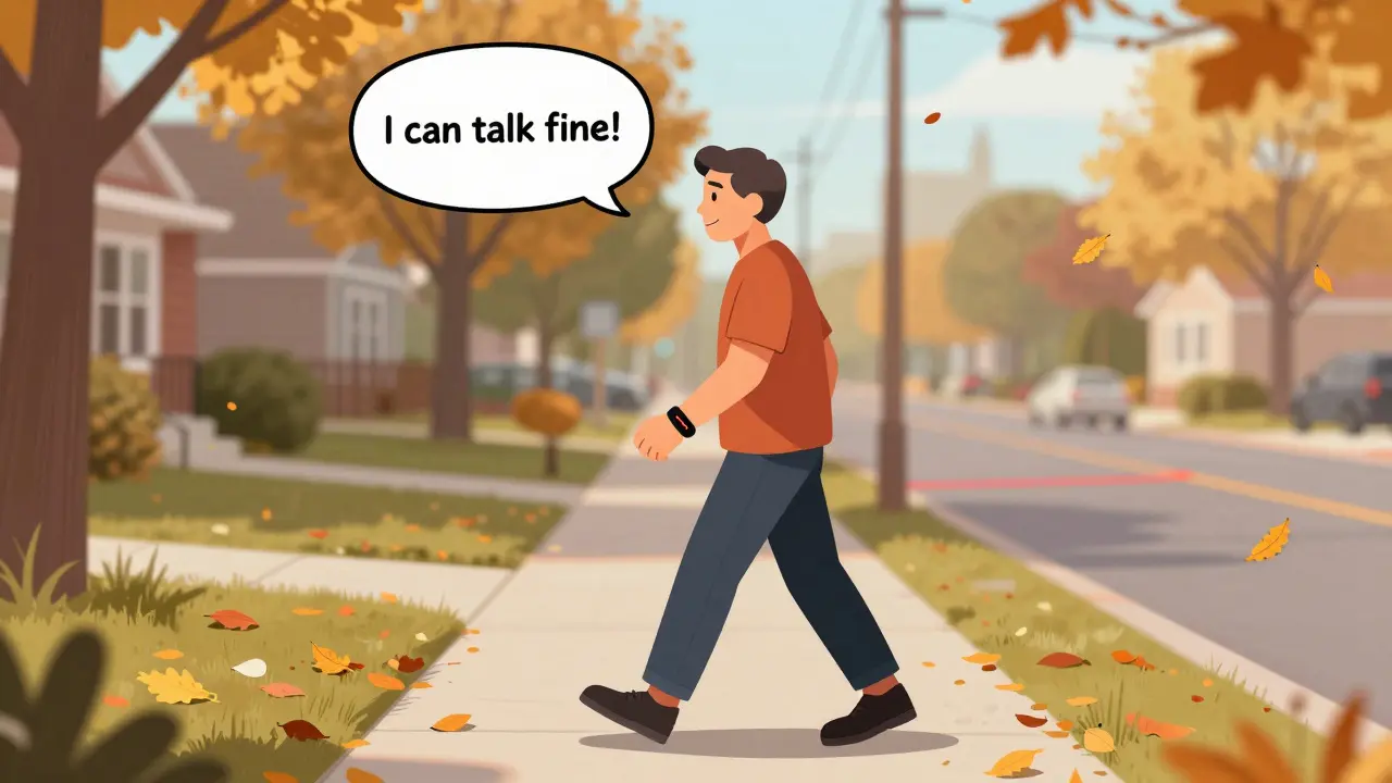 Person walking safely outdoors with heart rate monitor, smiling and talking comfortably.